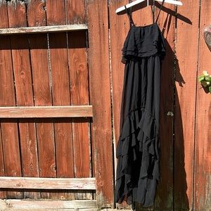 NEW WITH TAG. VENUS black hi/Lo dress size L. Retails for $69.99